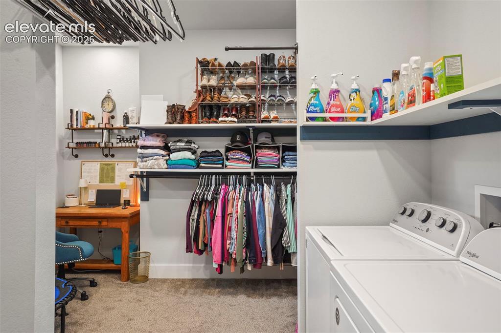 Image 23 of 46: Laundry in the master bedroom walk-in closet.