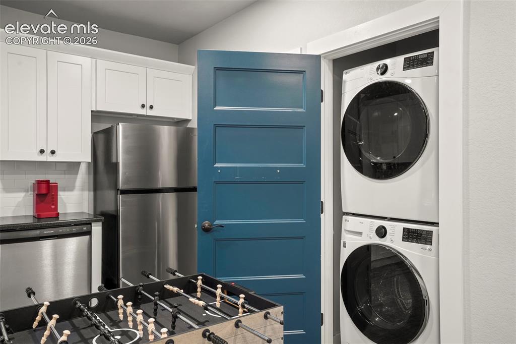 Image 30 of 46: Basement laundry closet. 