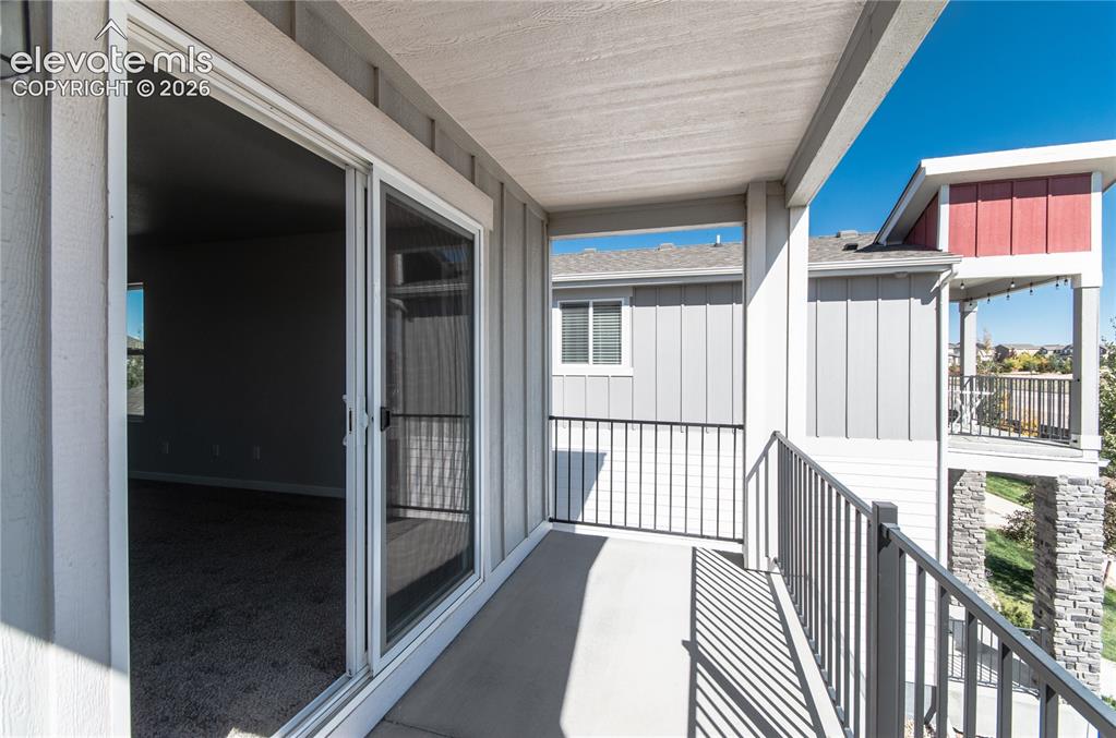 Image 10 of 20: Primary bedroom private deck