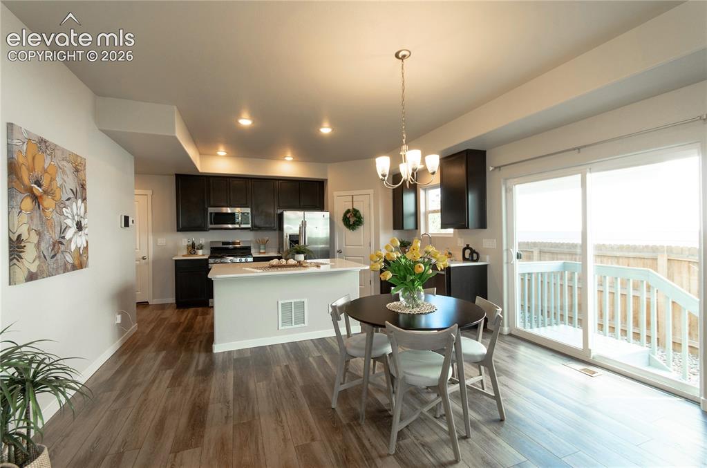 Image 6 of 20: Dining area / kitchen