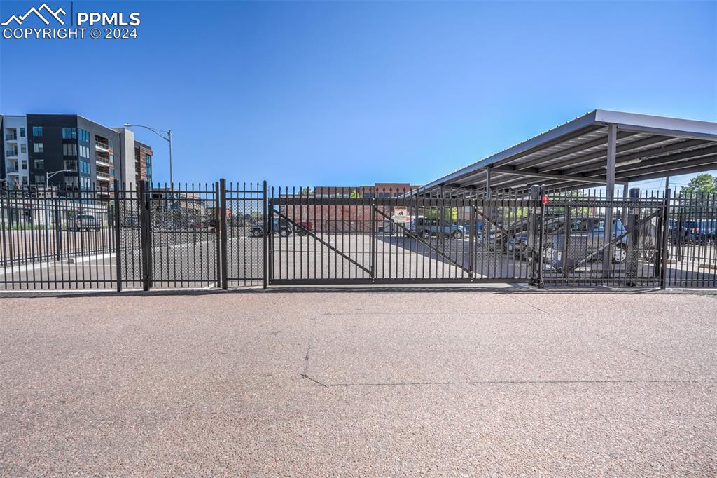 Image 50 of 50: Gated parking area