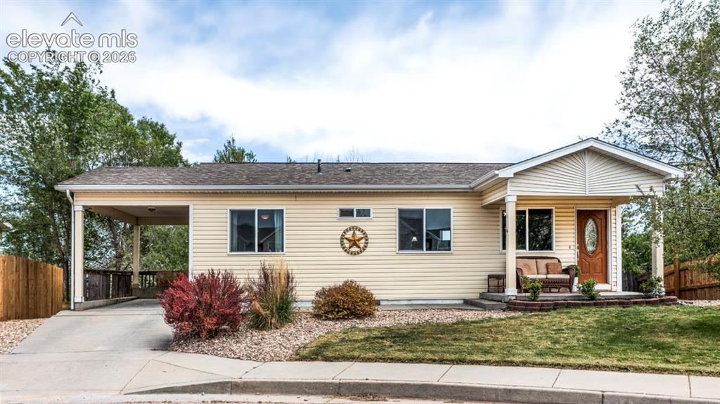 Image 1 of 41: front of home with covered carport