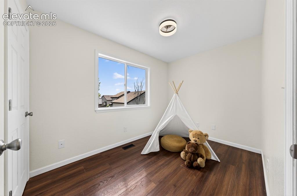 Image 17 of 41: bedroom 3 main floor