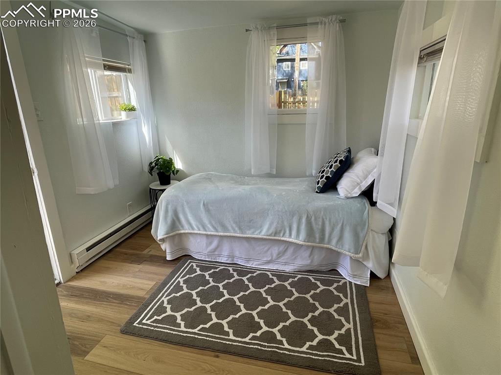 Image 10 of 30: Cottage Bedroom 