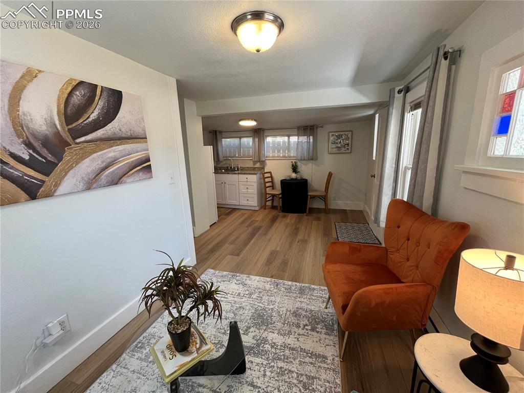 Image 14 of 30: Cottage Living Room open to kitchen