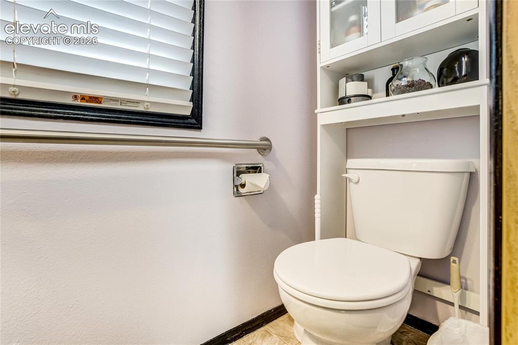 Image 8 of 39: Main level powder room