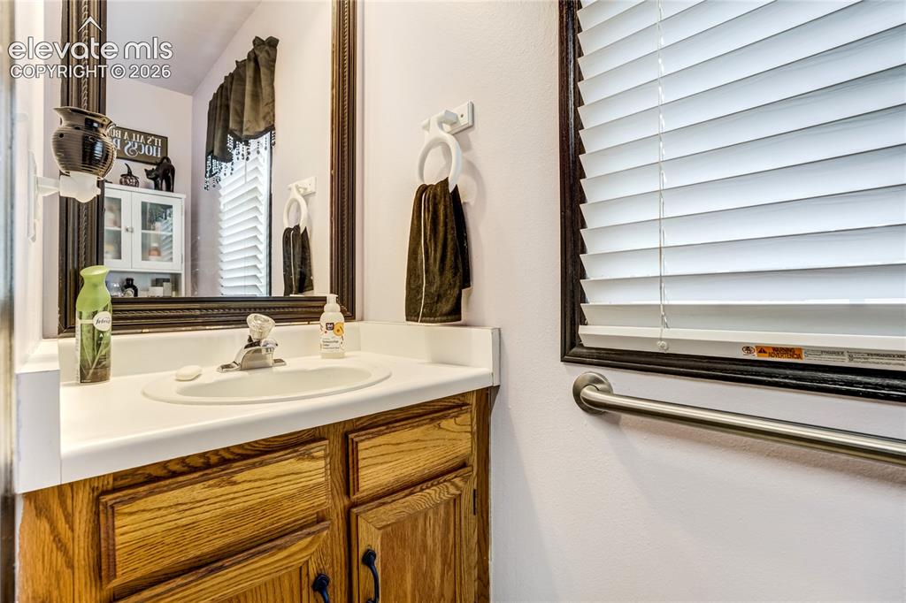 Image 9 of 39: Main level powder room