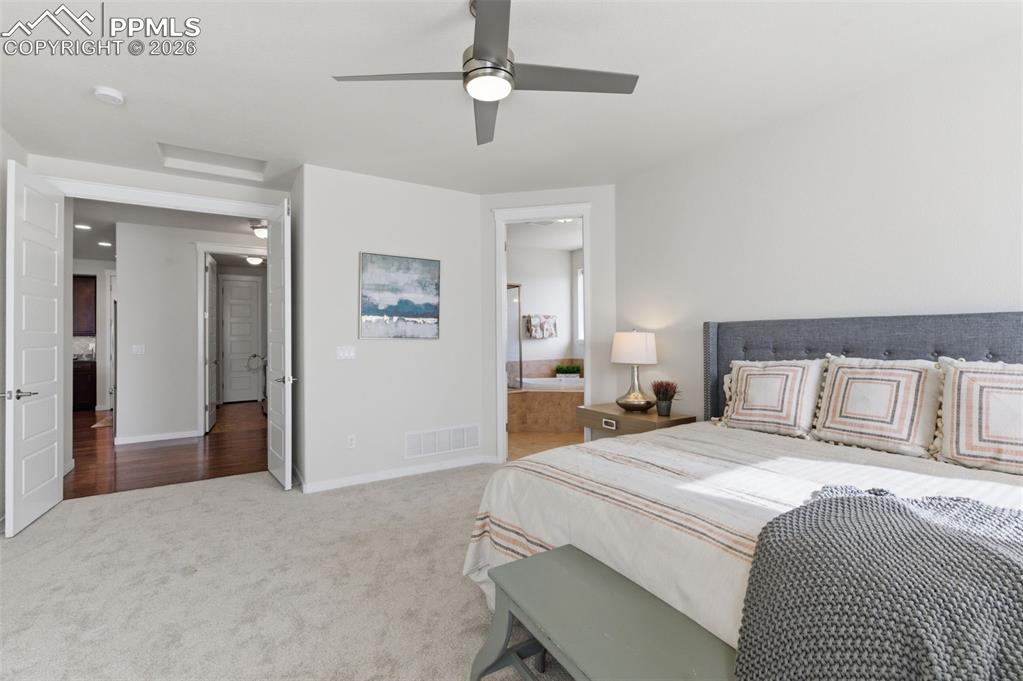 Image 19 of 50: Master Bedroom