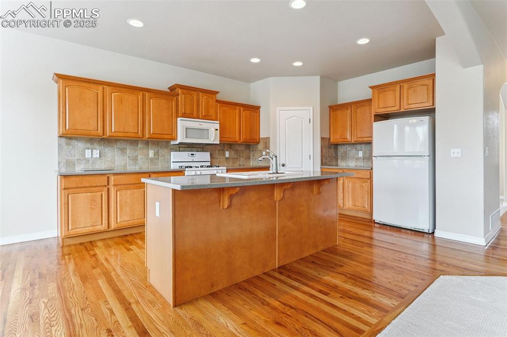 Image 20 of 46: Kitchen, main floor, corian countertops