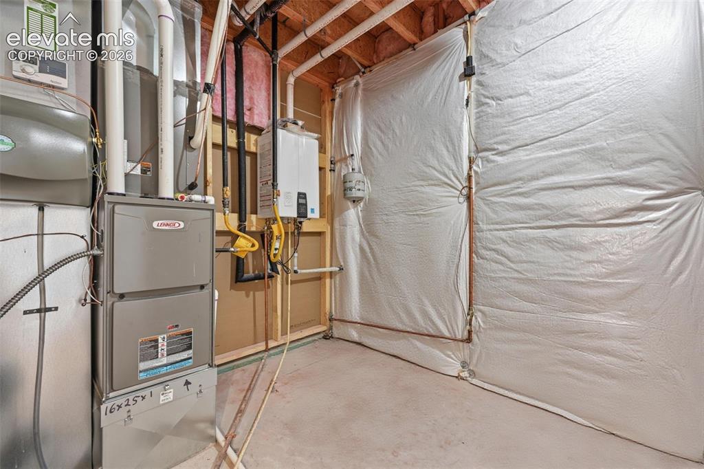 Image 37 of 48: tankless water heater and furnace with humidifier