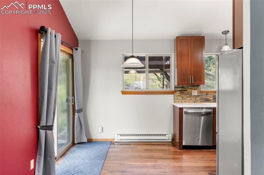 Image 12 of 30: View From the Living Room to the Dining Area