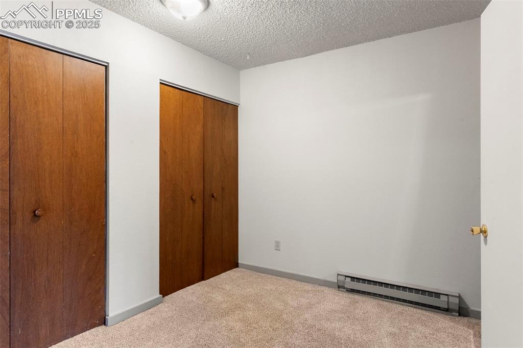 Image 24 of 30: Dressing Area in the Primary Bedroom