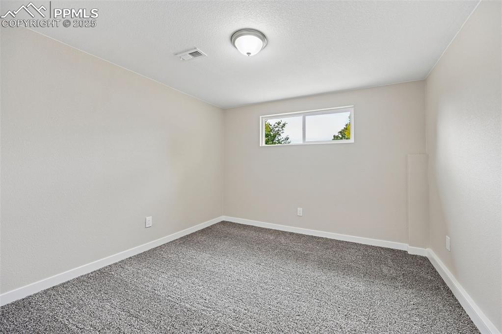 Image 28 of 36: Lower level bedroom 2