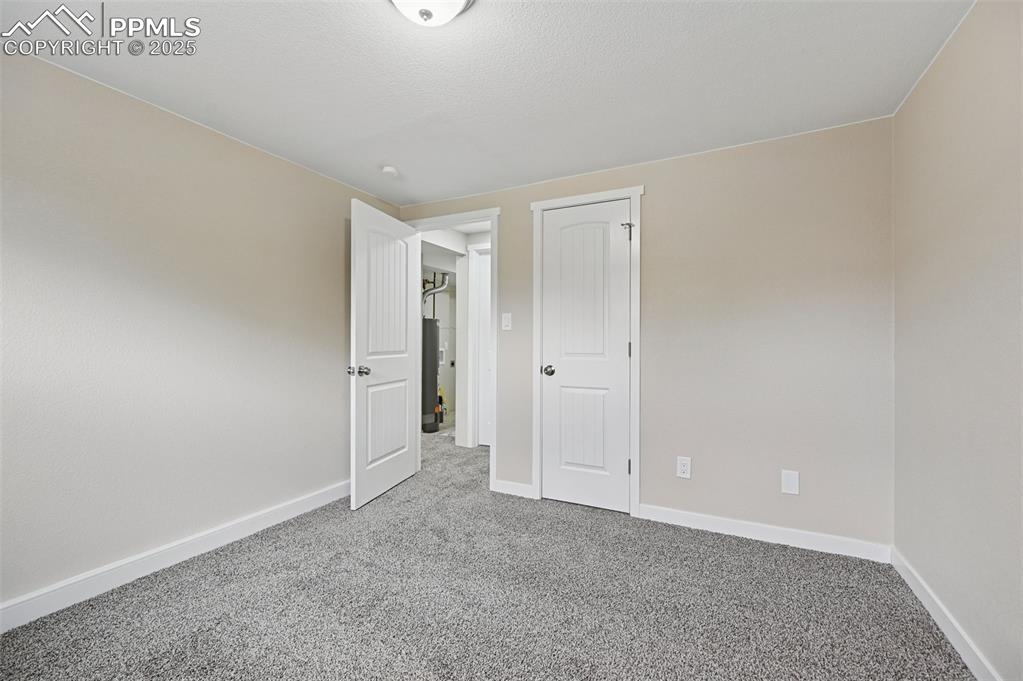 Image 29 of 36: Lower level bedroom 1