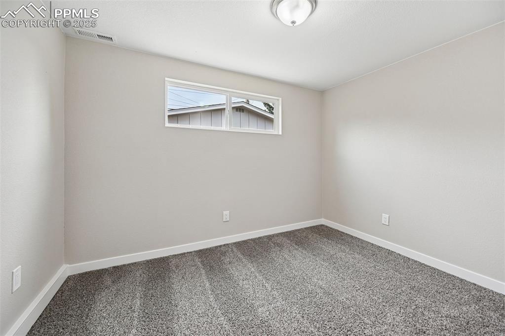 Image 31 of 36: Lower level bedroom 2