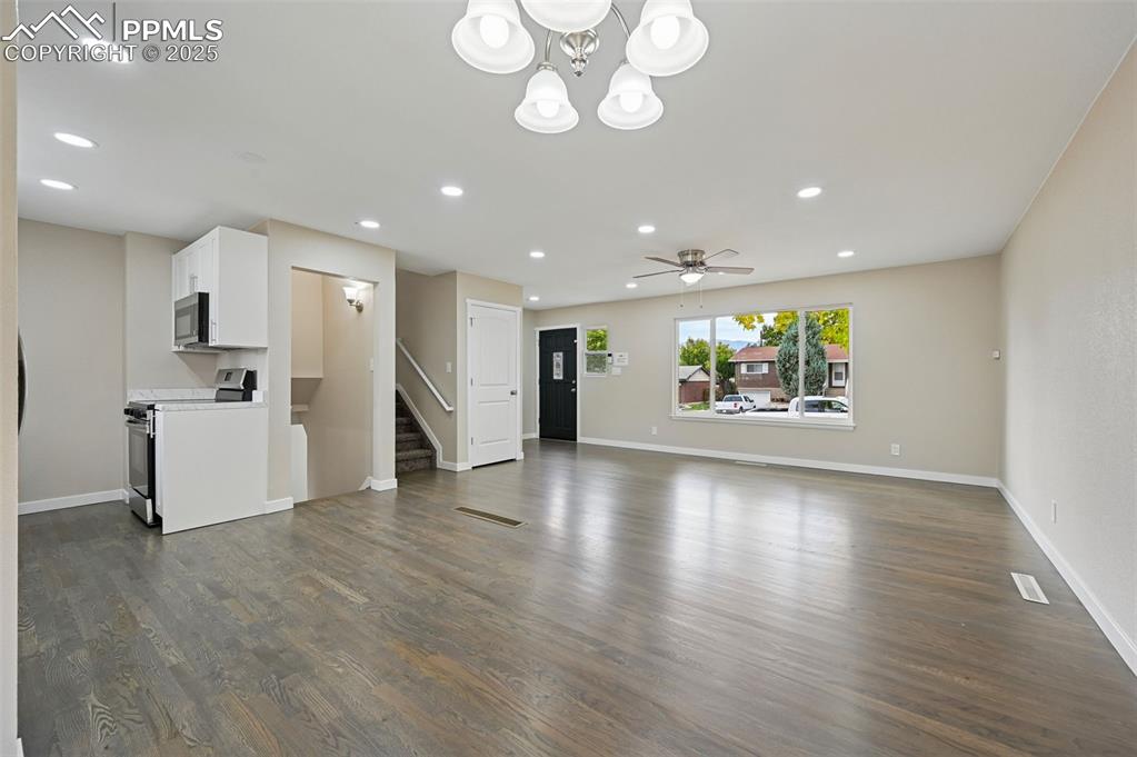 Image 7 of 36: Dining area with hardwood floors