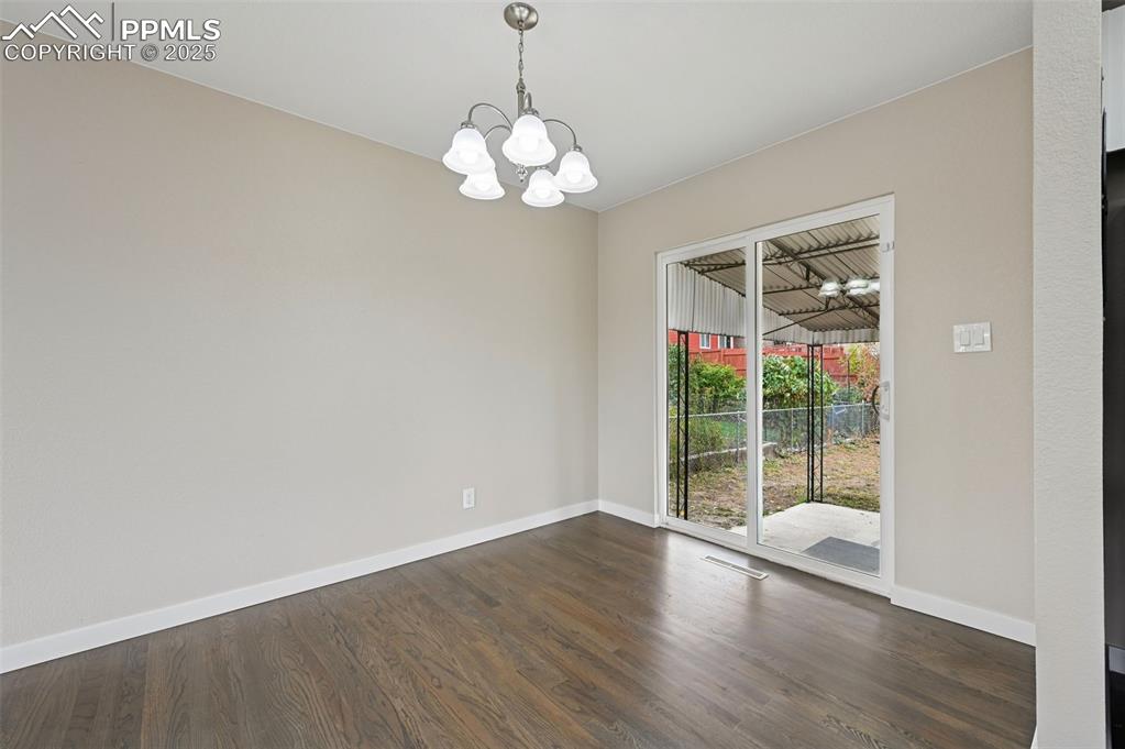 Image 8 of 36: Walk-out from dining room
