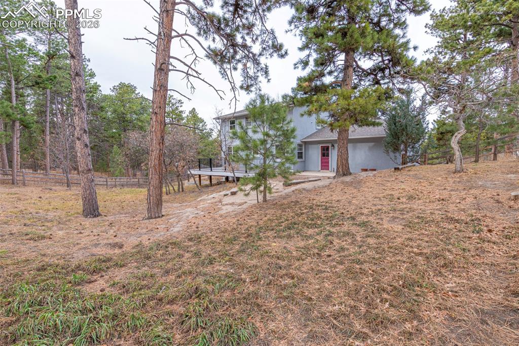 Image 32 of 35: Fenced in Backyard 