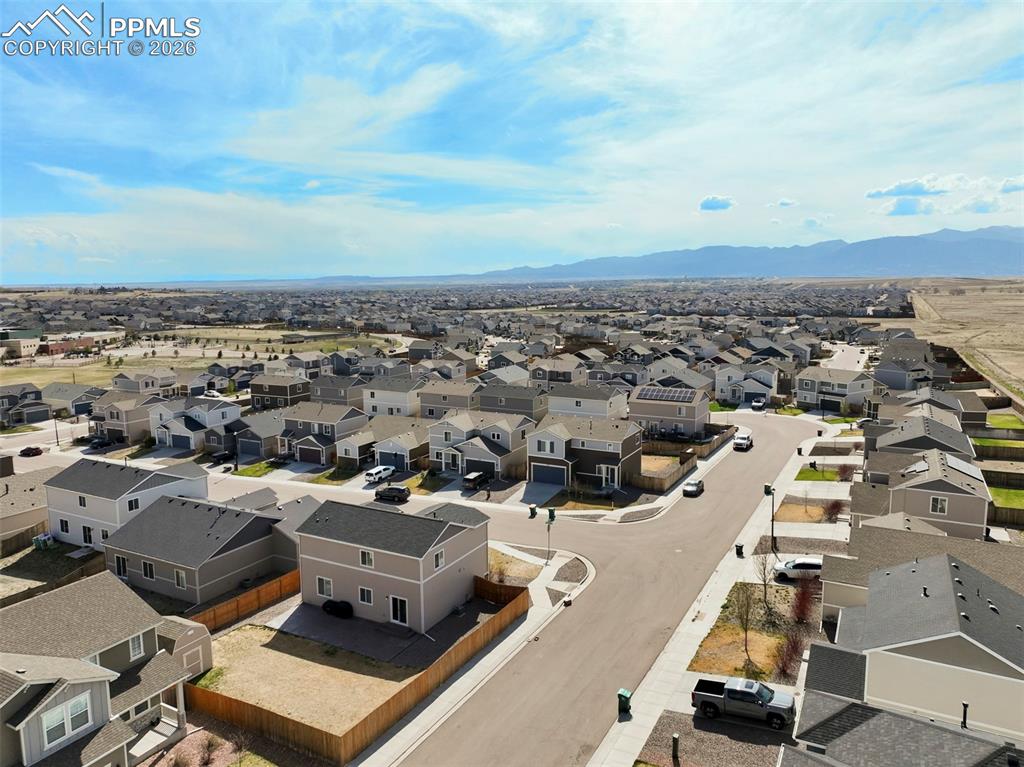 Image 44 of 46: Expansive suburban neighborhood featuring numerous residential properties