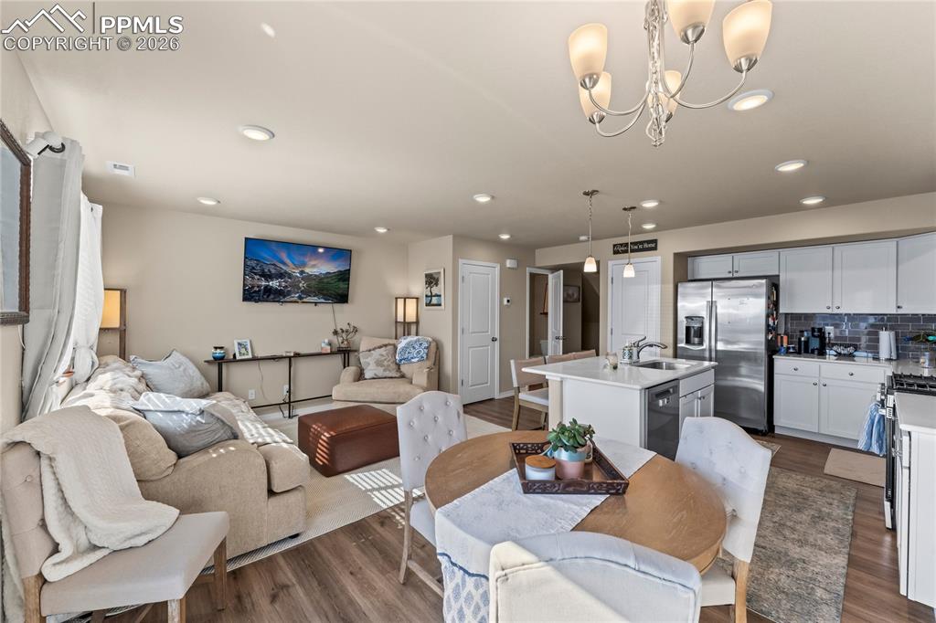 Image 14 of 37: From the kitchen, you get a full view of the main living space, ideal for s