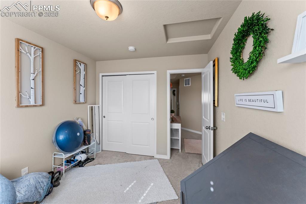Image 28 of 37: A second angle shows the full layout, including closet storage and space fo