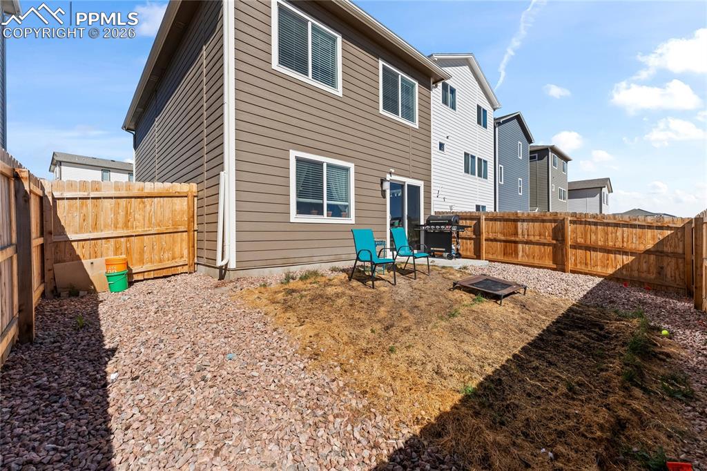 Image 32 of 37: Low-maintenance landscaping keeps upkeep simple while still providing usabl