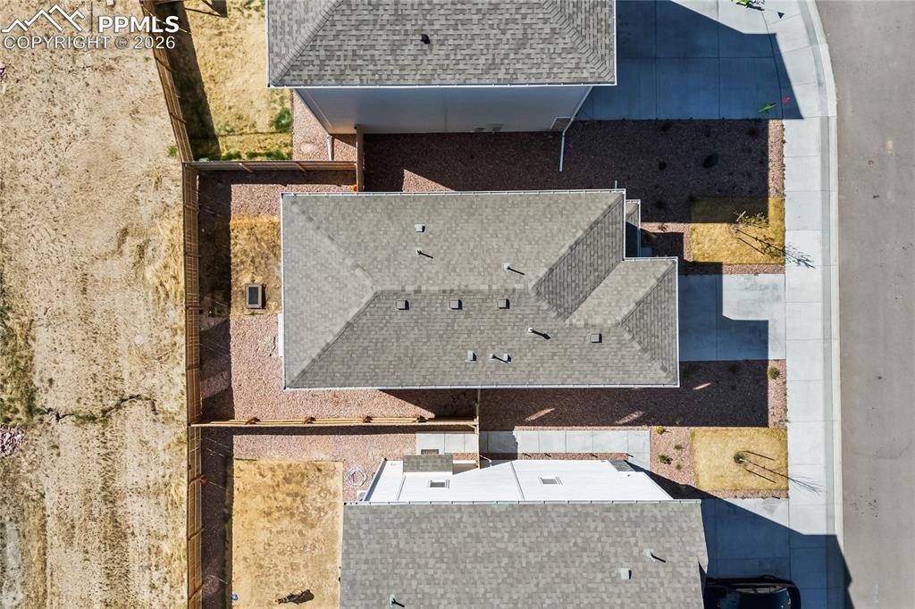 Image 37 of 37: Looking straight down, you can actually see how usable the lot is, fenced, 
