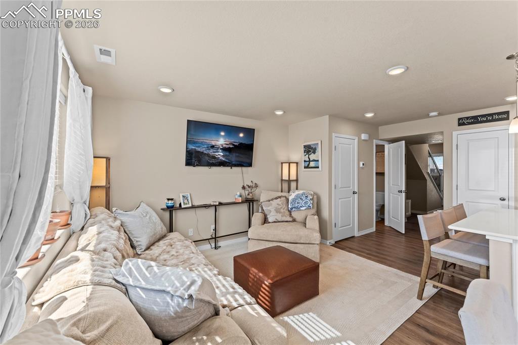 Image 4 of 37: A well-defined seating area offers plenty of space for everyday living whil