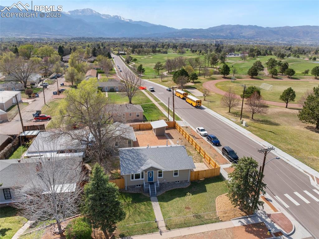 Image 3 of 37: Aerial view with a mountain view and a residential view