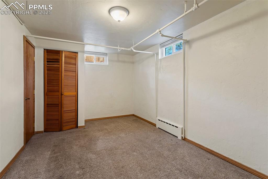 Image 30 of 37: Basement Bedroom