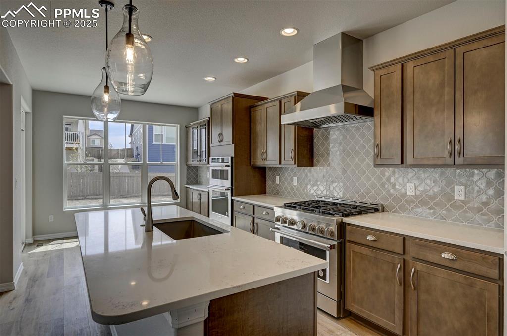 Image 3 of 23: 36" commercial gas range plus oven/microwave built-in