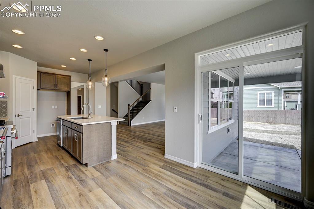 Image 6 of 23: dining area, sliding door to covered patio