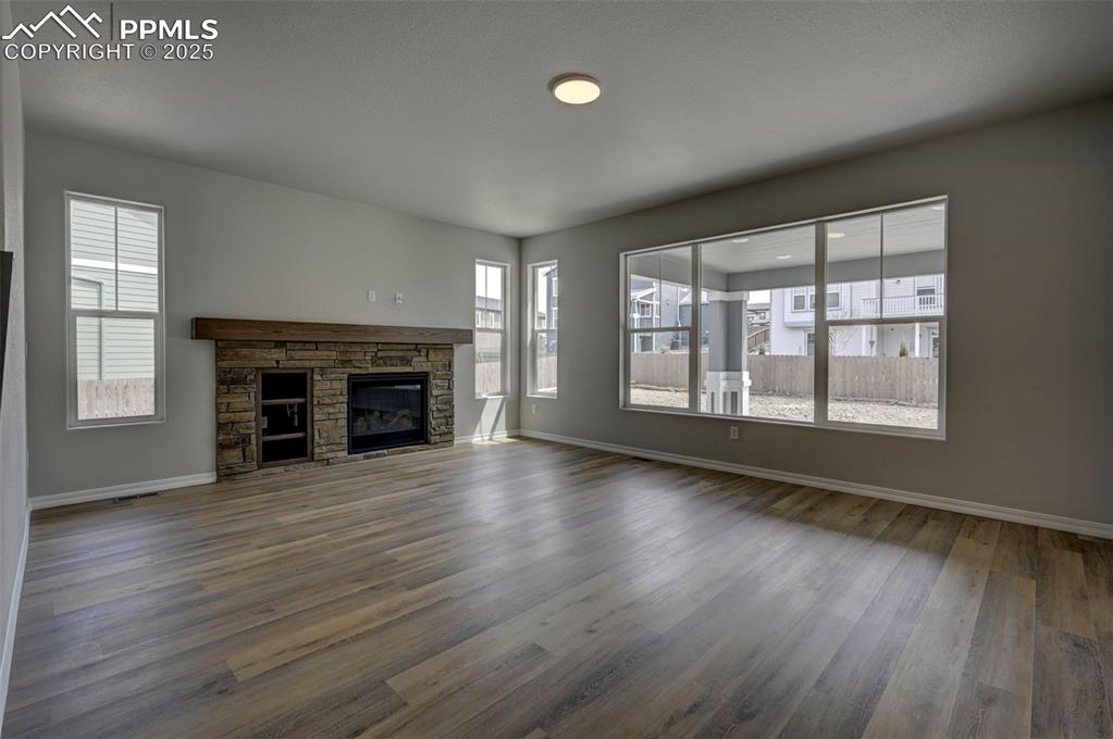 Image 7 of 23: Gas fireplace in the greatroom