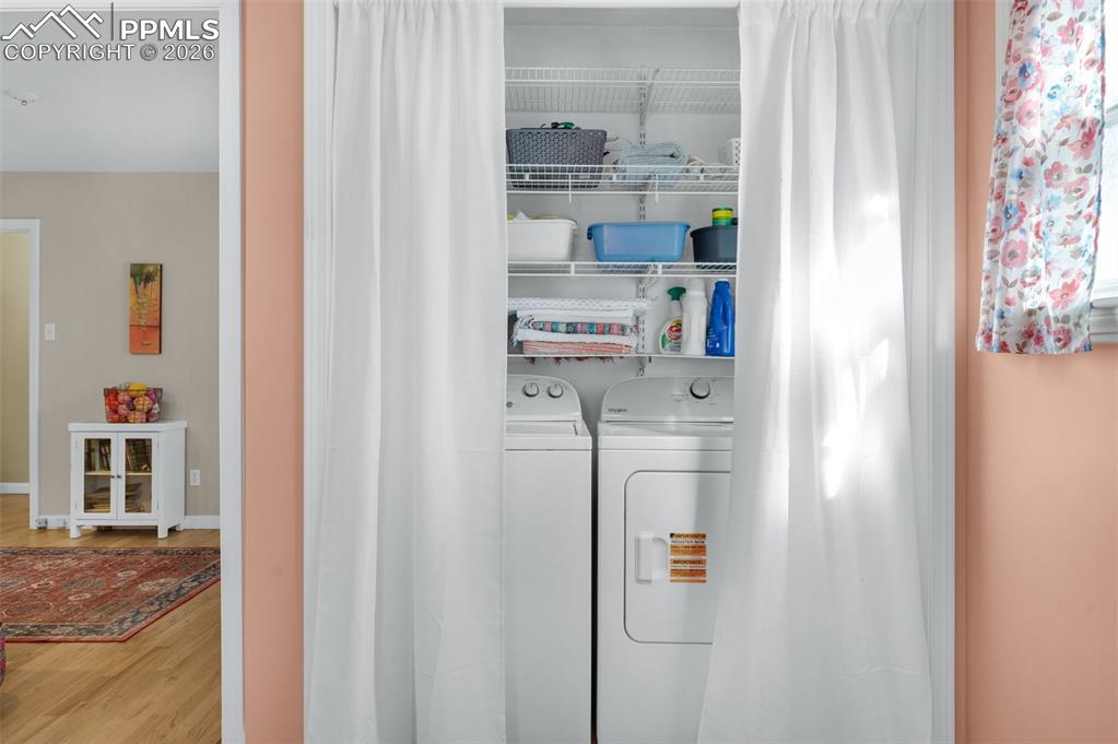 Image 11 of 28: Laundry is off the kitchen