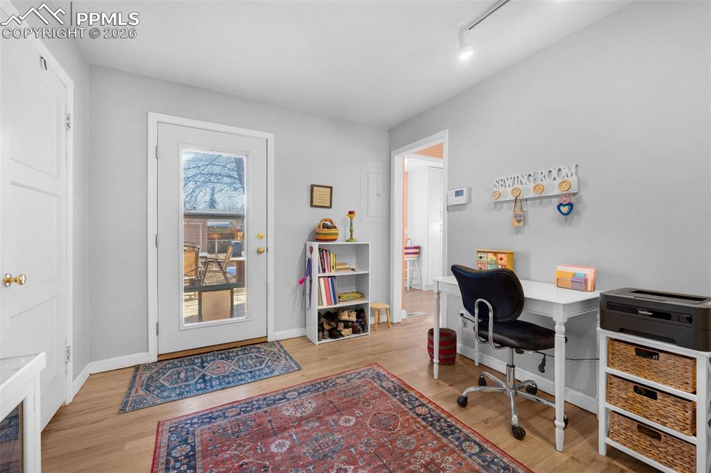 Image 14 of 28: This room is adjacent to the kitchen