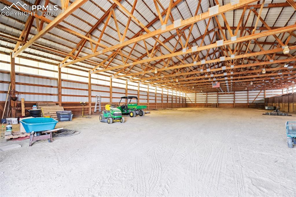 Image 28 of 43: Garage featuring metal wall