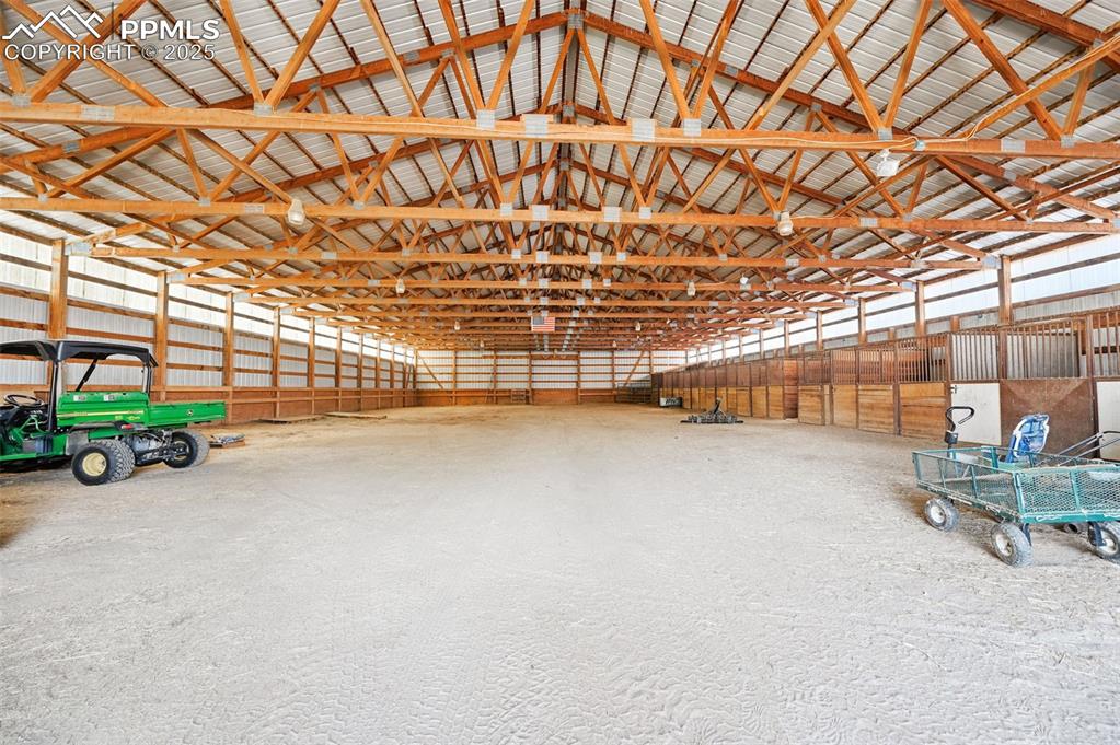 Image 33 of 43: Garage featuring metal wall