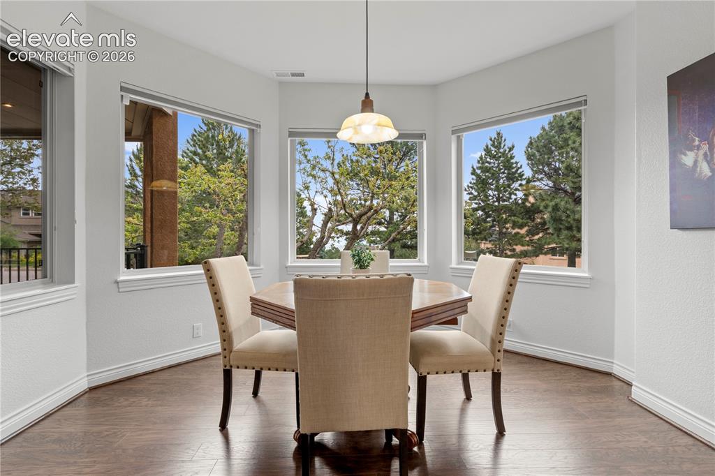 Image 11 of 47: breakfast area with amazing views and opens to deck