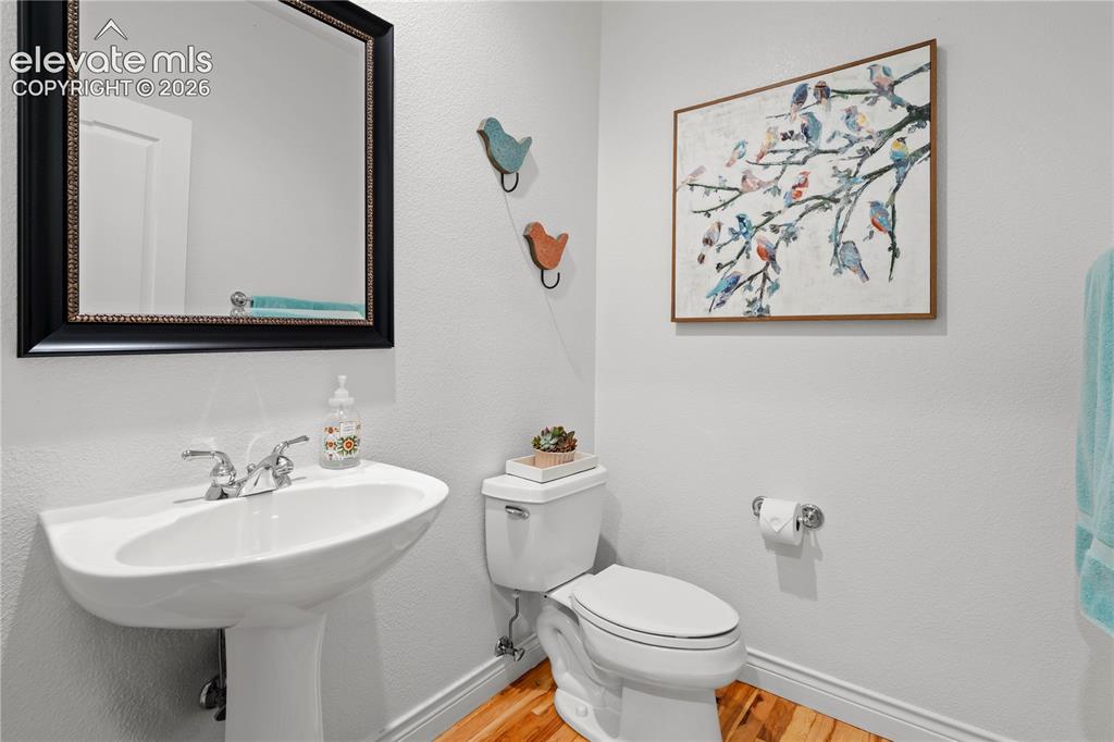 Image 15 of 47: main level powder room