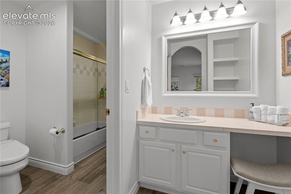 Image 40 of 47: upper level vanity and sink 
