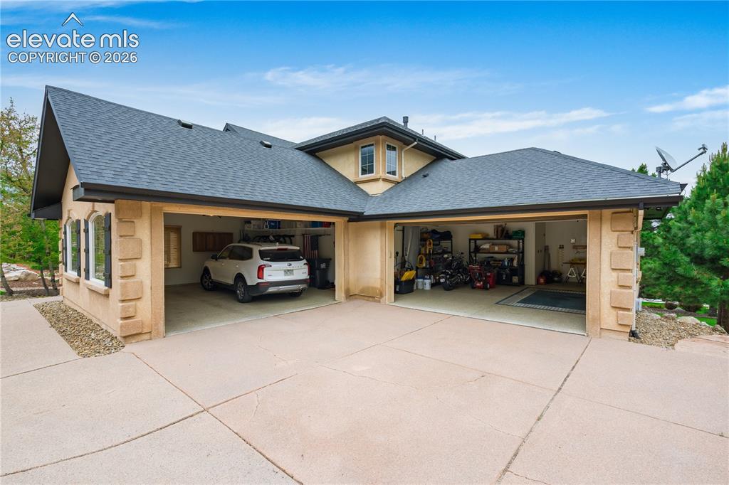 Image 47 of 47: massive 1028sq ft  epoxied garage for all the Colorado necessities.