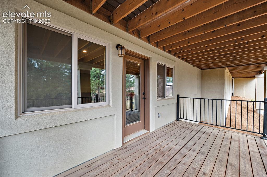 Image 29 of 45: Deck off family room lower level