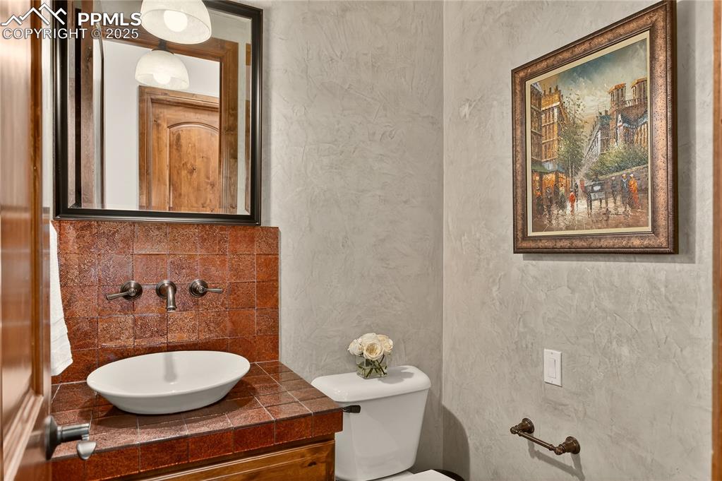 Image 13 of 41: Powder room - main level