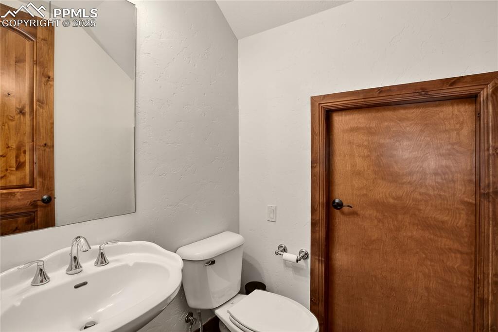 Image 19 of 41: Powder room - main level