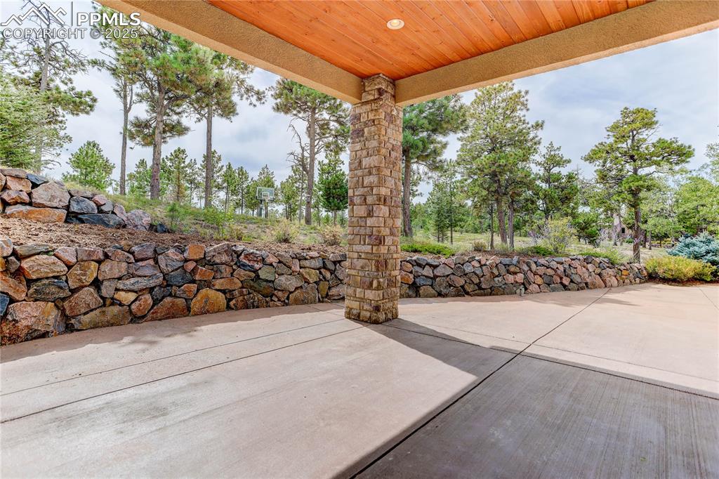 Image 35 of 41: Covered back patio