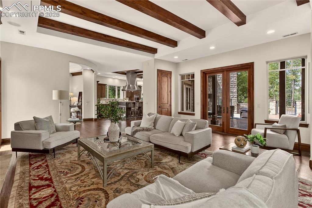 Image 7 of 41: Living room access to courtyard