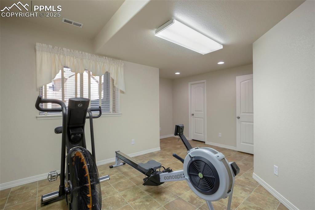 Image 19 of 33: Flex Room!  Workout/Sewing/Craft/Storage etc.