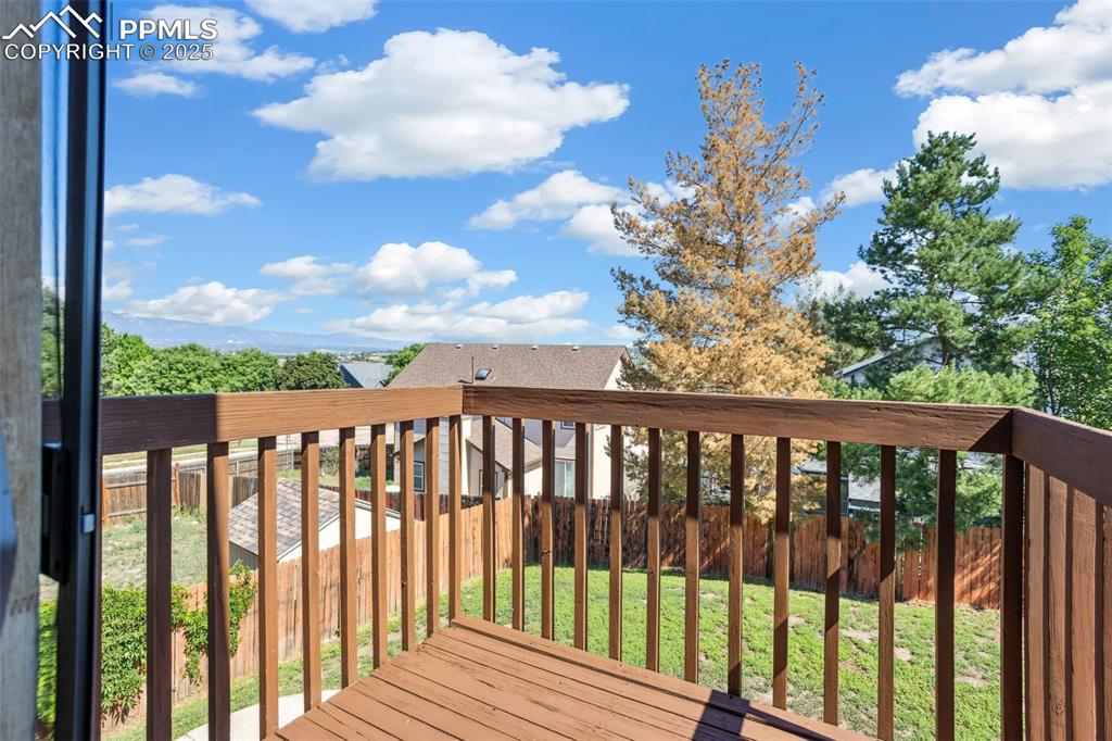 Image 21 of 29: Primary bedroom deck with views