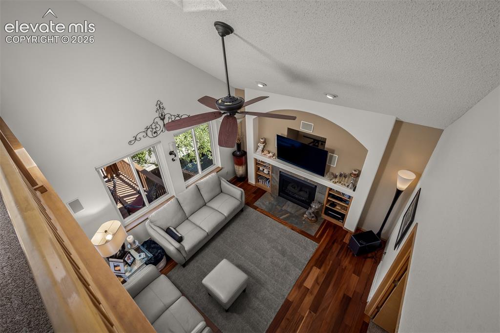 Image 24 of 50: View from loft of family room.