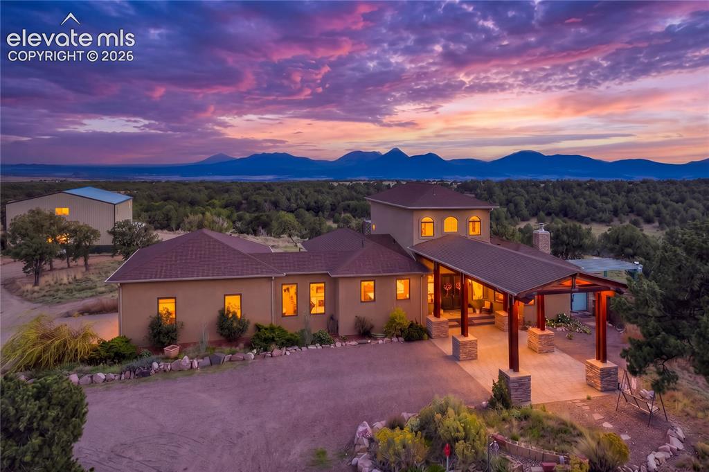 Caption: Over 36 acres - with 2 car portico